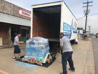 CelinaMoving&StorageHurricanHarveyFoodDrive2017-flood the truck (11).jpg