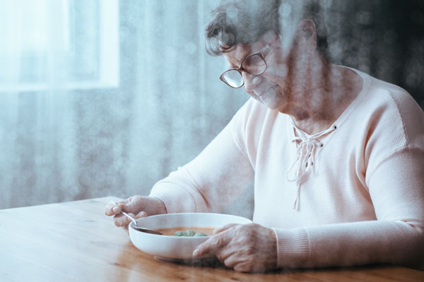 SeniorHungryEatingSoupWomanLadyFoodDinnerTableHome.jpg