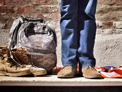 soldieroffdutyWaitingWithBagsOutside.jpg