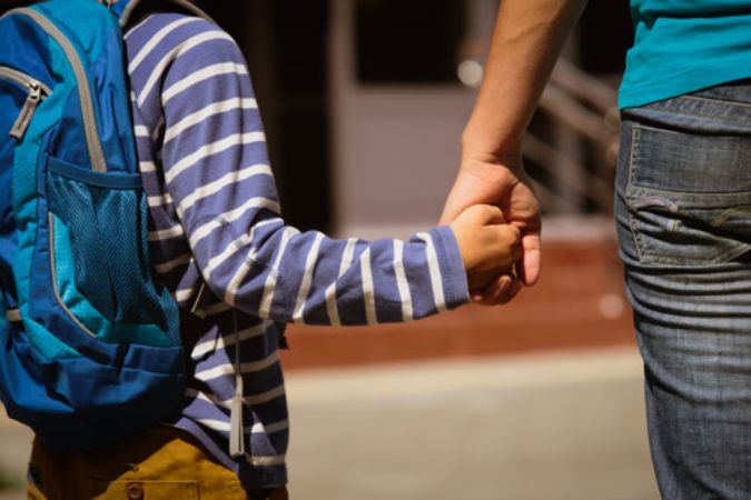 holdinghandsfamilyDadSchoolBusWalkingOutsidekidchildren.jpg